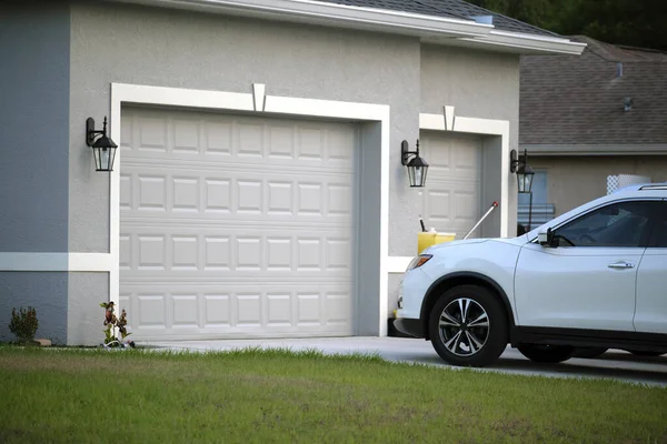 Car Parked Front Wide Garage Double Door Concrete Driveway New — Stockfoto