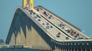 Sunshine Skyway Bridge over Tampa Bay in Florida with moving traffic. Concept of transportation infrastructure.