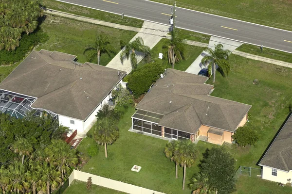 stock image Aerial view of small town America suburban landscape with private homes between green palm trees in Florida quiet residential area.