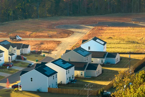 stock image Aerial view of construction site with new tightly packed homes in South Carolina. Family houses as example of real estate development in american suburbs.