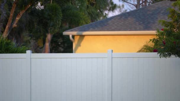 White Vinyl Fence Surrounding Private Property Grounds Backyard Protection Privacy — Stock Video