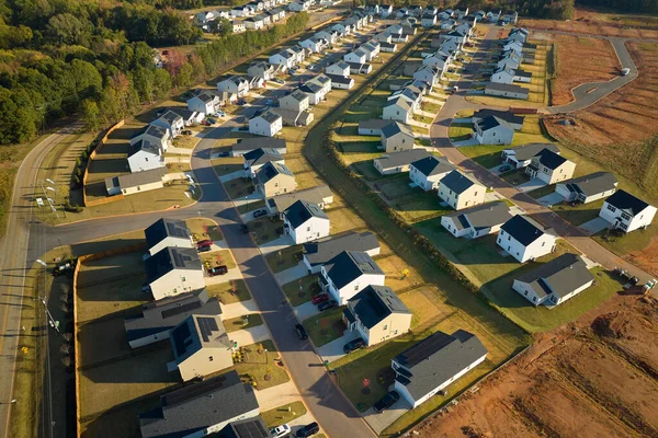 stock image Aerial view of tightly located new family houses in South Carolina suburban area. Real estate development in american suburbs.