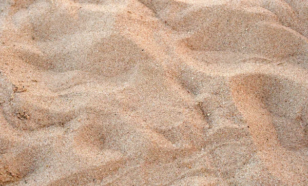 Płaski Widok Czystej Żółtej Powierzchni Piasku Pokrywającej Nadmorską Plażę Tekstura — Zdjęcie stockowe