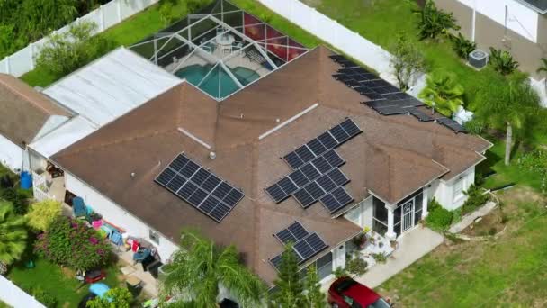 Standard American Residential House Rooftop Covered Solar Photovoltaic Panels Producing — Stock video