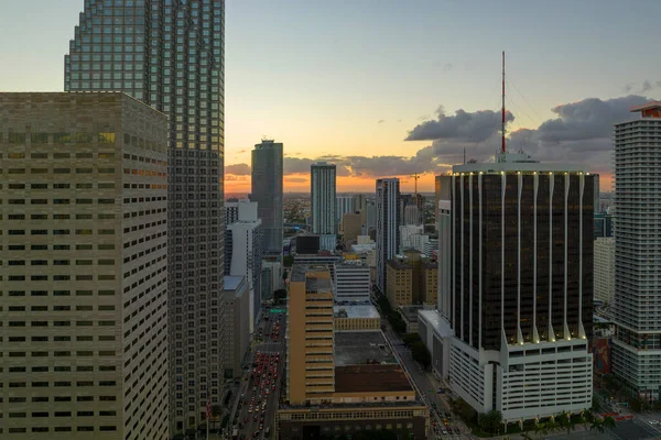 stock image Aerial view of downtown office district of of Miami Brickell in Florida, USA at sunset. High commercial skyscraper buildings and urban traffic in modern american megapolis.