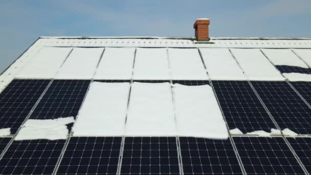 Aerial View Snow Melting Covered Solar Photovoltaic Panels Installed House — Stock Video