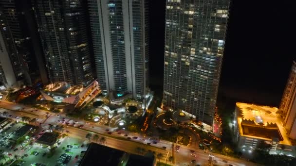 View Brightly Illuminated City Street Dense Traffic High Skyscraper Buildings — Stock Video