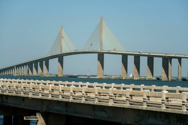 Sunshine Skyway Bridge over Tampa Bay in Florida with moving traffic. Concept of transportation infrastructure.