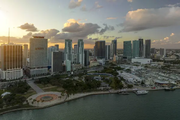Aerial view of downtown district of of Miami Brickell in Florida, USA at sunset. High commercial and residential skyscraper buildings in modern american megapolis.