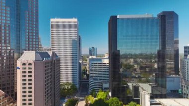 Aerial view of downtown district of Charlotte city in North Carolina, USA. Glass and steel high skyscraper buildings in modern American midtown.