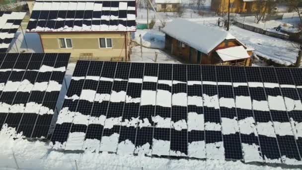 Aerial View Snow Melting Covered Solar Photovoltaic Panels Installed House — Stok video