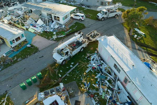 Florida Southwest region after hurricane season. Collapsed and damaged mobile homes in rural residential area. Consequences of severe natural disaster.