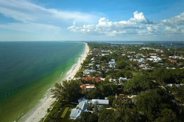 Rich neighborhood with expensive vacation homes in Boca Grande, small town on Gasparilla Island in southwest Florida. Wealthy waterfront residential area.