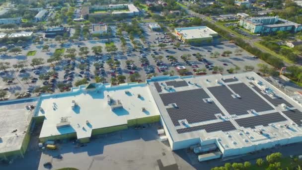 Aerial View Many Photovoltaic Panels Installed Shopping Mall Roof Top — Wideo stockowe