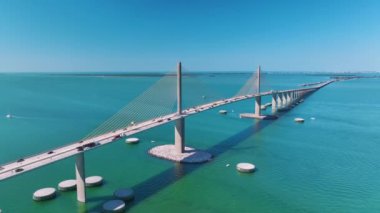 Sunshine Skyway Bridge over Tampa Bay in Florida with moving traffic. Concept of transportation infrastructure.