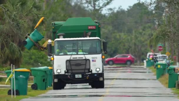 American Garbage Truck Picking Trash Bins Rural Street Side — Stock Video