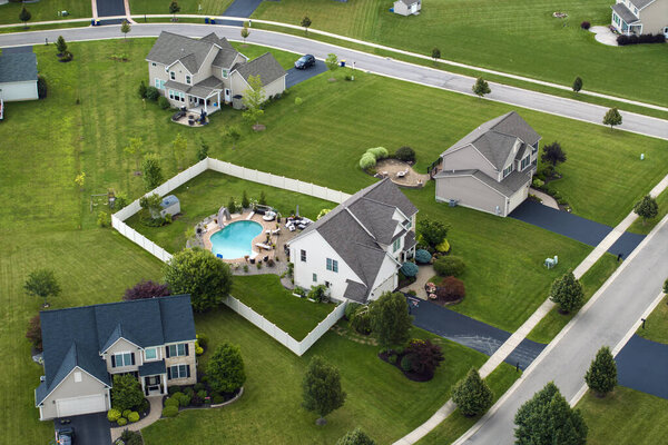 Housing market in the USA. Residential homes in suburban sprawl development in Rochester, New York. Low-density two story private houses in rural suburbs.