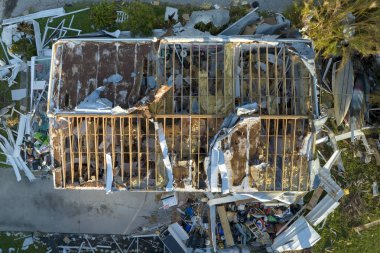 Destroyed by hurricane Ian suburban houses in Florida mobile home residential area. Consequences of natural disaster. clipart