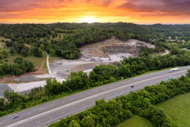 Sand open-pit mining quarry with processing plant for crushed stone. Extracting of natural resources for construction industry. clipart