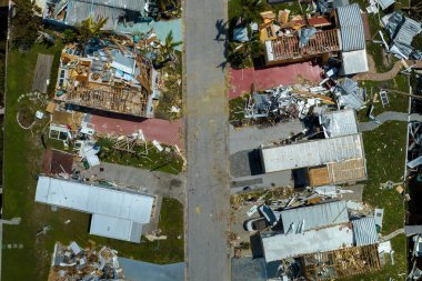 Destroyed by hurricane Ian suburban houses in Florida mobile home residential area. Consequences of natural disaster. clipart