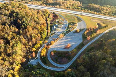 Beech Glenn Parking rest area in Appalachian mountains near busy I-26 American interstate freeway with fast moving cars and trucks. Recreational resting place during interstate traveling. clipart