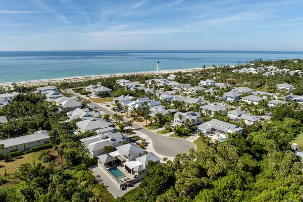 Expensive residential houses in island small town Boca Grande on Gasparilla Island in southwest Florida. American dream homes as example of real estate development in US suburbs.