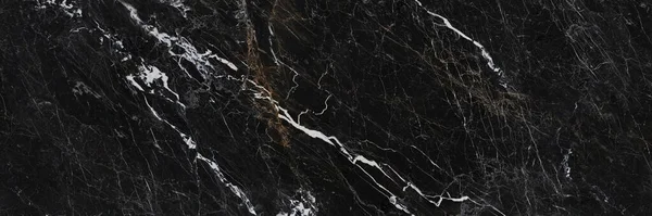 Altın damarlı siyah mermer dokular