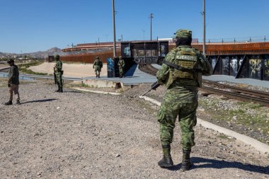 Juarez, Mexico 10-20-2022: The Mexican Army guards the US-Mexico border to deter migrants from crossing illegally.