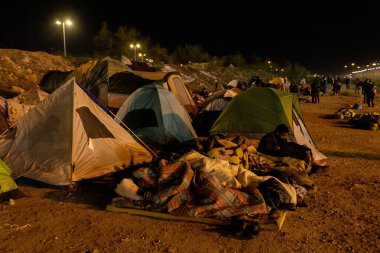 Juarez, Mexico 01-07-2022: Migrants from Venezuela set up a makeshift camp to wait for the end of title 42.