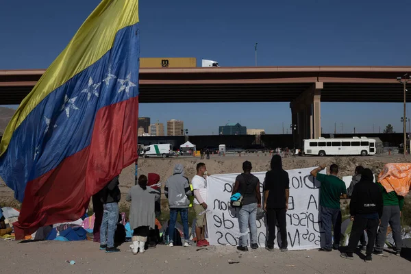 Juarez, Mexico, 10-24-2022: Venezuelan migrants protest at the border to request the termination of title 42, a law that allows migrants to be expelled immediately