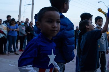 Juarez, Mexico, 11-28-2022: Migrants mostly from Ecuador and Bolivia travel in trucks towards the border between Mexico and the United States with the intention of requesting humanitarian asylum.