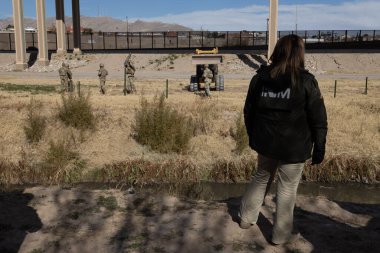 Juarez, Mexico, 07-01-2023: Agents from the National Institute of Migration monitor the Rio Grande to discourage migrants from crossing the border into the United States.
