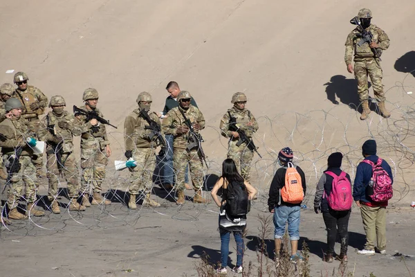 stock image Thousands of migrants from Latin America wait at the southern border of the United States for Title 42 to end, the Texas Governor ordered the Texas National Guard to maintain surveillance on the border to prevent the massive entry of migrants