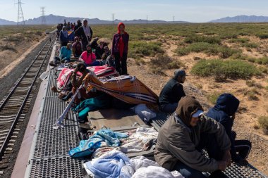 Hundreds of Migrants Travel on a Freight Train Known as 'La Bestia' to Reach the Mexico-U.S. Border for Humanitarian Asylum, Juarez, Chihuahua, Mexico, 03102023. clipart