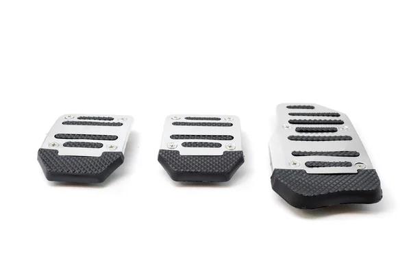 aluminum cover of manual car pedal, gas, clutch and brake isolated on white background