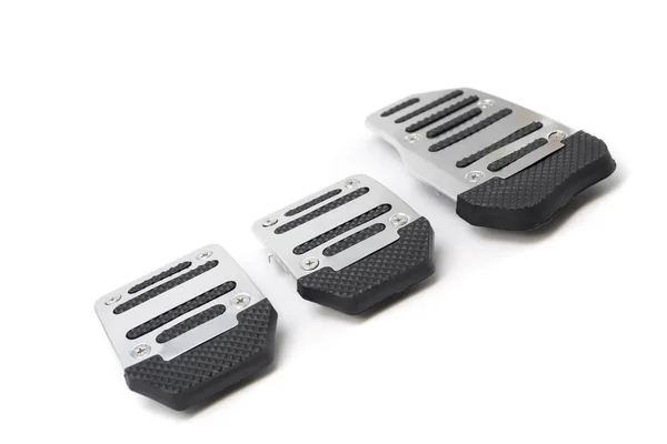 aluminum cover of manual car pedal, gas, clutch and brake isolated on white background