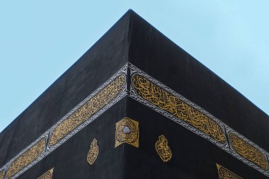 Detailed replica of the Kaaba with calligraphy.