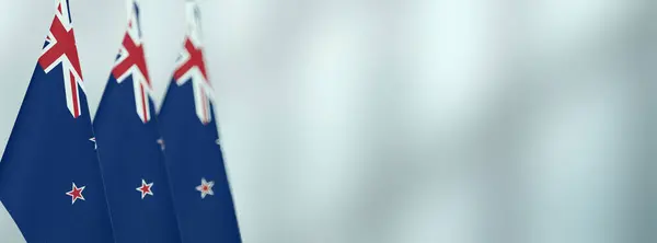 Ofiste Yeni Zelanda masa bayrakları, metin için alanı olan afiş arkaplanı