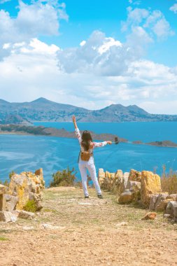 horizontal photo of a young latin brunette woman taking selfie o