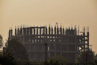 Erection of reinforced concrete building with cast-in-place technology, Construction Site, Polluted growth 