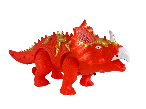 stock image Triceratops child plastic toy dinosaur red yellow color isolated on white background. Perfect for displaying promotional products