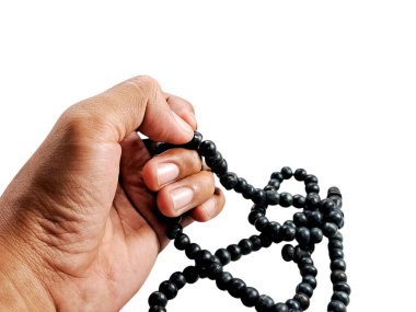 hand holding a set of prayer beads, symbolizing spirituality and reflection. Perfect for religious themes, spiritual concepts clipart