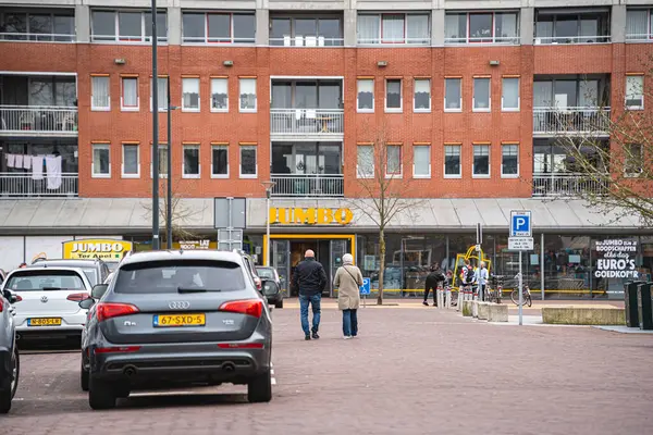 Stock image Ter Apel, the Netherlands - March 30, 2024: Parking Spots at Shopping Center Ter Apel with Jumbo Supermarket