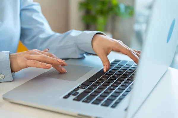 stock image Close up shot businesswoman hands using laptop computer typing on keyboard, searching information, browsing. Female student on manager internship