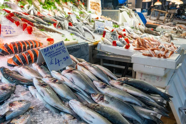 Central fish market with displays and counters with various seafood.in Athens, Greece. Retail place o healthy food.