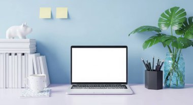 A bright and airy workspace featuring a laptop, books, and a plant on a desk against a blue wall. Perfect for showcasing modern office or home office setups. The scene is clean and minimal.
