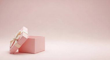 An open pink gift box with a ribbon is set against a pink backdrop, offering ample copy space. Ideal for birthdays, celebrations, and romantic occasions.