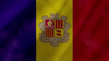Andorra bayrağı gerçek kumaş dokusuyla arka planda dalgalanıyor