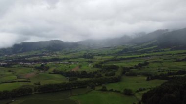 Aerial view of the San Miguel island green fields, Azores, Portugal. High quality 4k footage