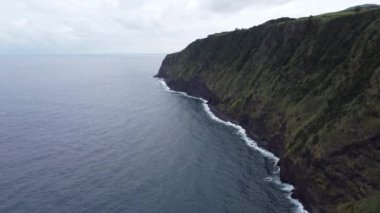 Natural coastline of Azores Islands. Lava rocks formation. Rocky Mountain landscape. Sao Miguel, Azores island.
